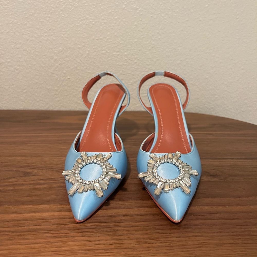 Slingback Pumps (heels) with stunning jewel detail.